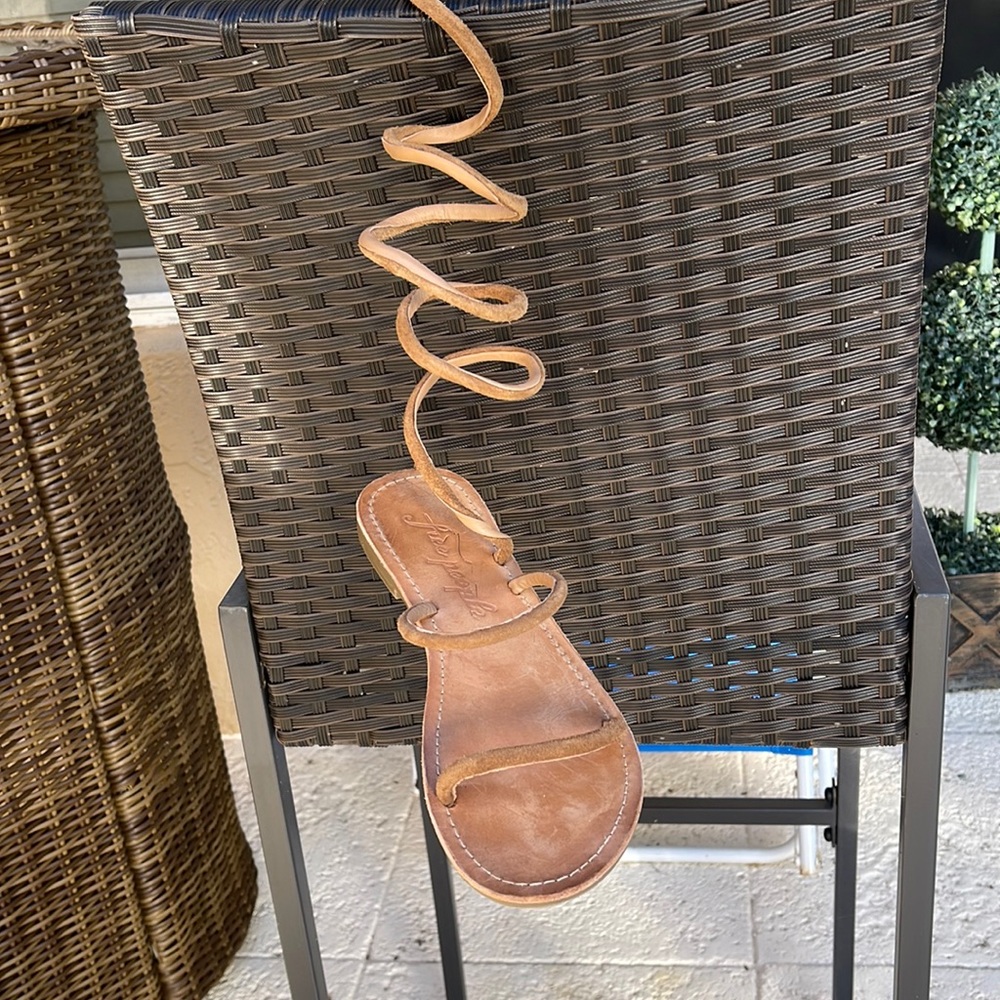 Size 8.5 Free People wrap around sandals.